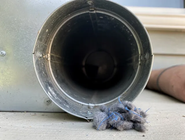 Coto de Caza Dryer Vent Cleaning technician using specialized equipment to clear severe dryer vent blockage in Coto de Caza